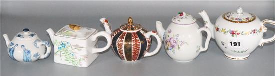 Twelve ceramic teapots